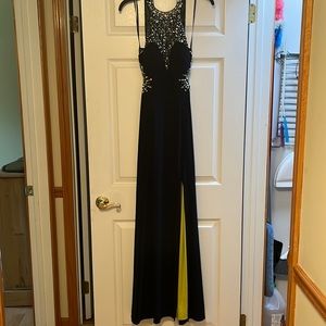 Navy blue and lime green gown by Betsy & Adam